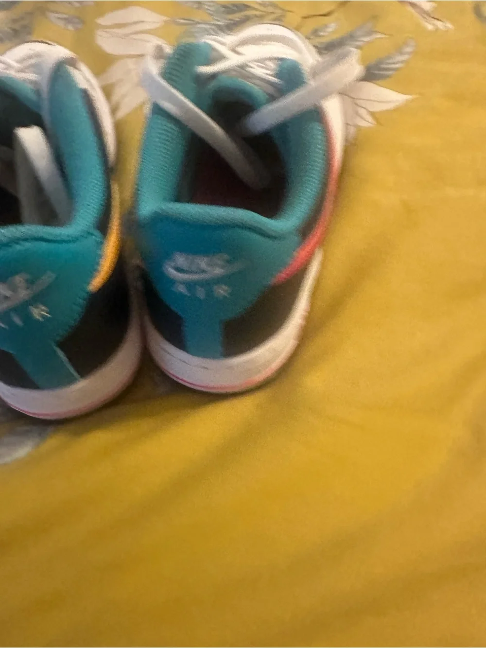 Nike Kids White Low-Top Sneakers with Teal and Pink Accents
